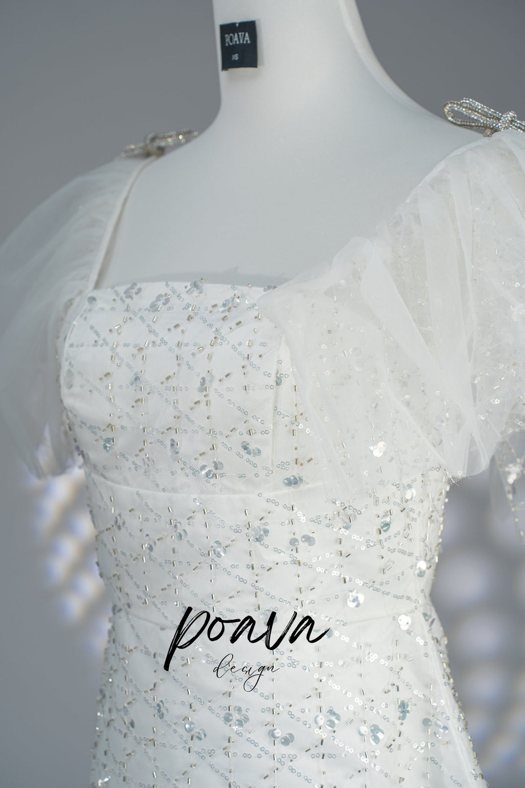 Sequin bow mini dress in white