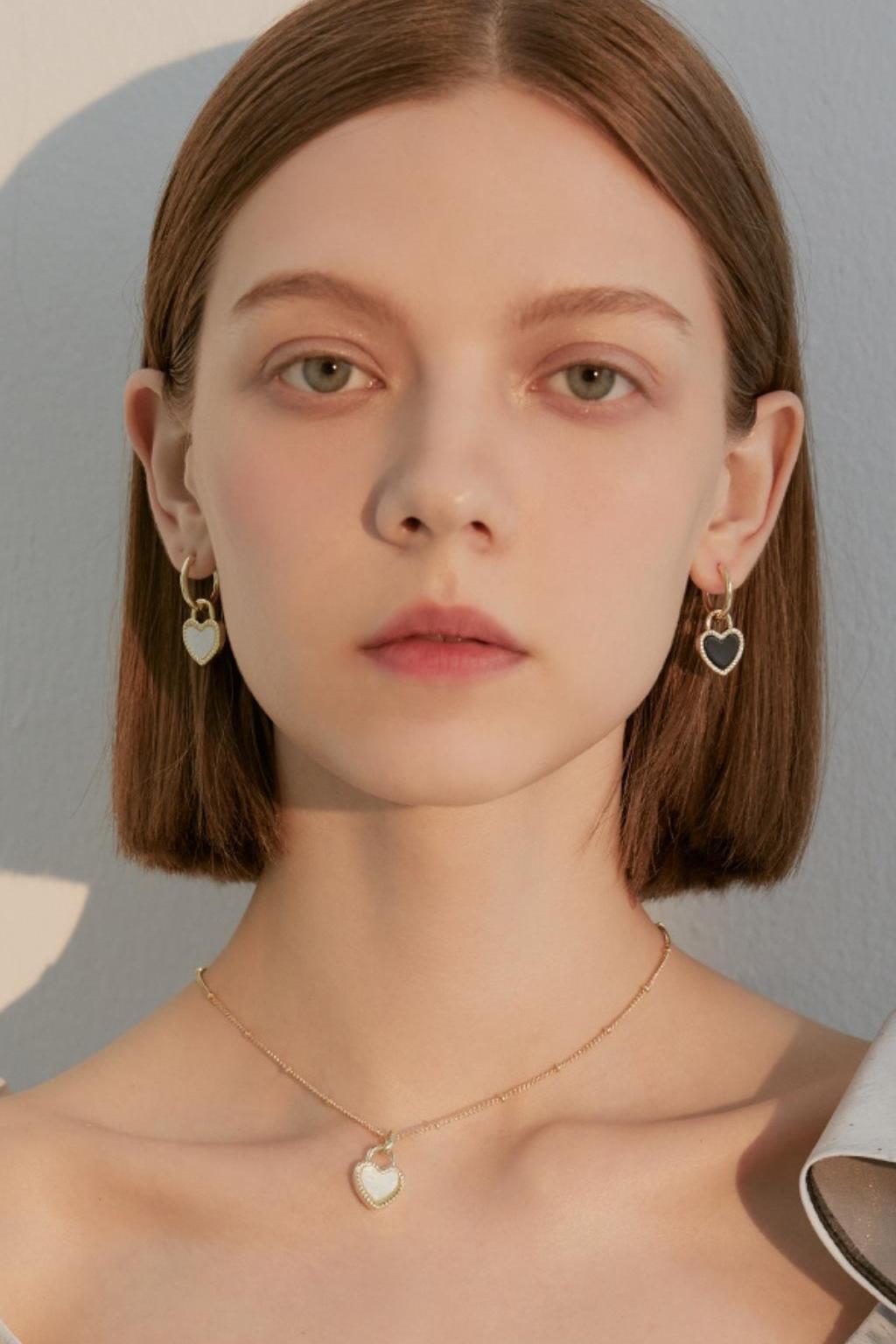 BLACK AND WHITE HEART ACRYLIC EARRINGS