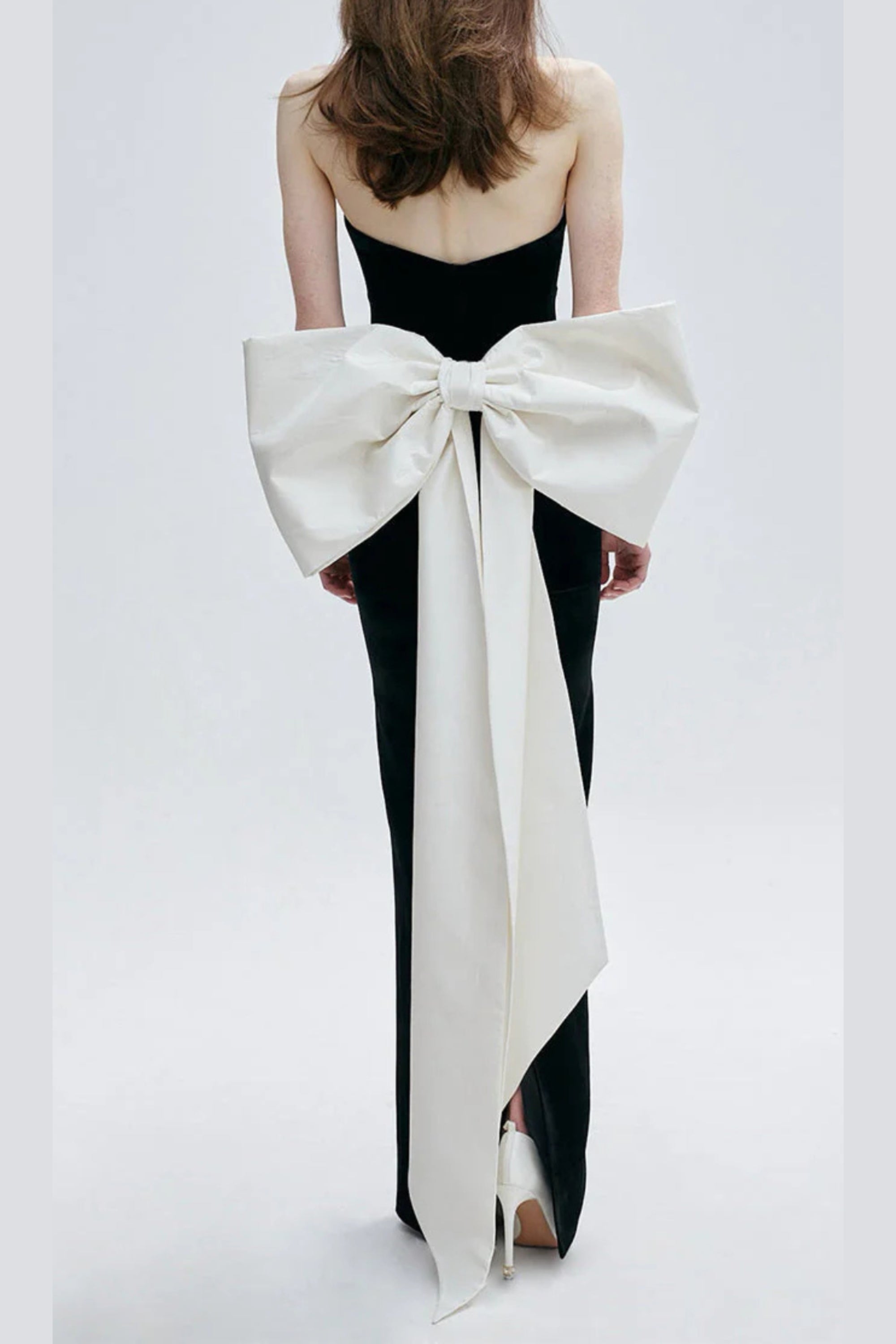 hermosa silk strapless bow gown in black