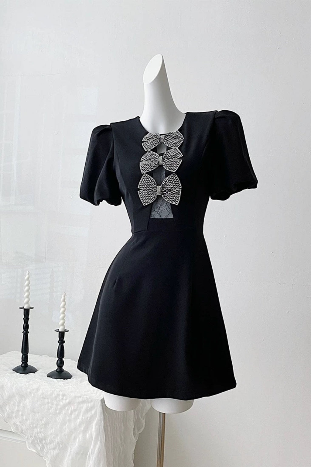 vanessa bow puff sleeve mini dress in black