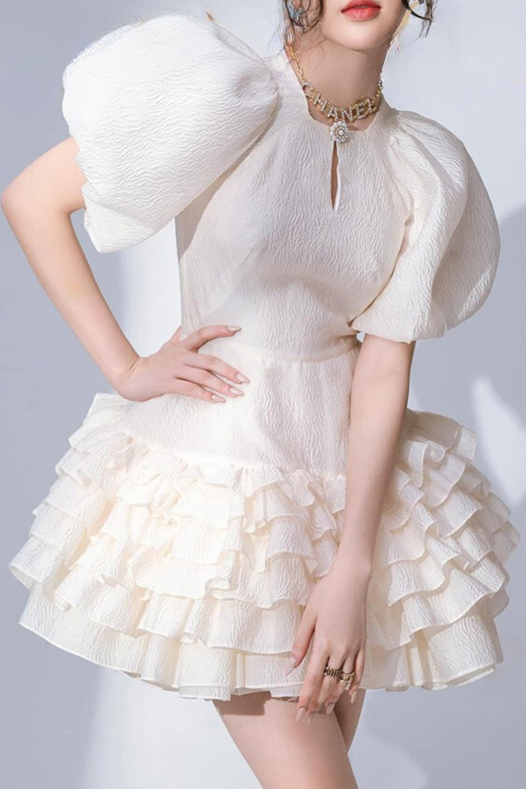 FLARED BUBBLE MINI DRESS IN WHITE