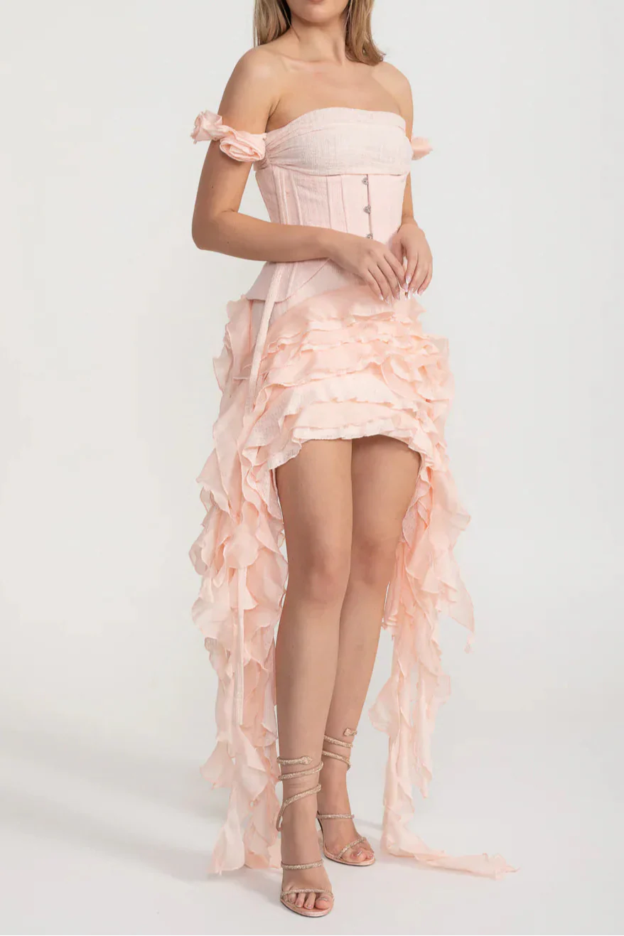Vintage Inspired Corset Dress With Ruched Bustier And Flowing Ruffled Side Details - Pink