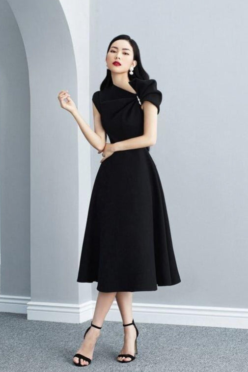 ASYMMETRIC SLEEVE PEARLS MIDI DRESS IN BLACK